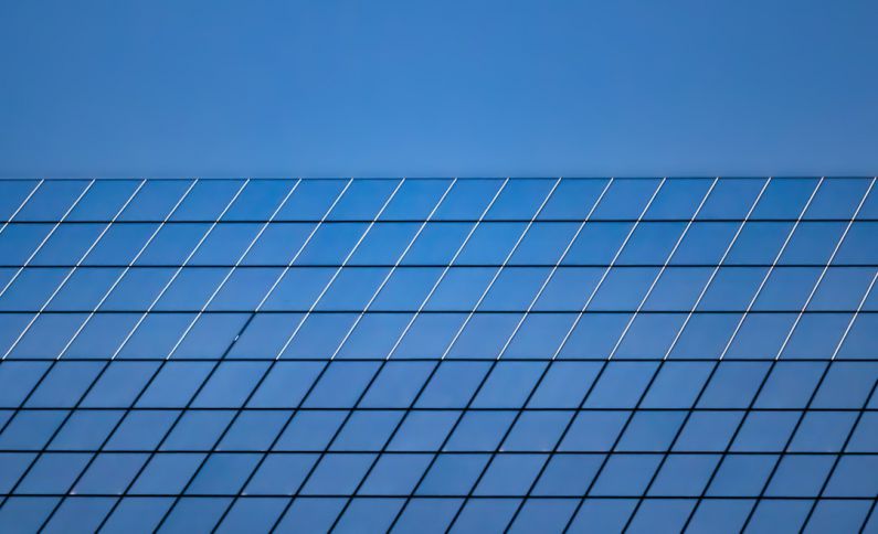 Solar Panels Angle - a close up of a blue building
