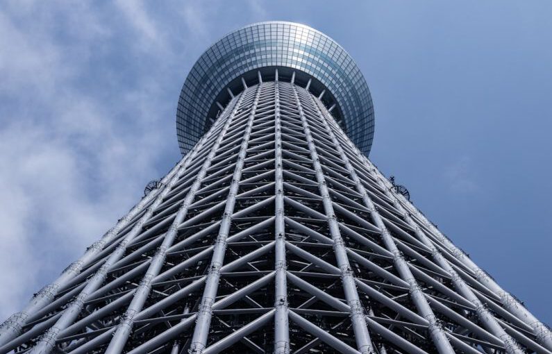 Solar Mounting Structure - grey tower with round top under grey cloudy sky