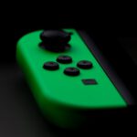 Solar Charge Controller - close-up photography of Nintendo Switch neon green controller