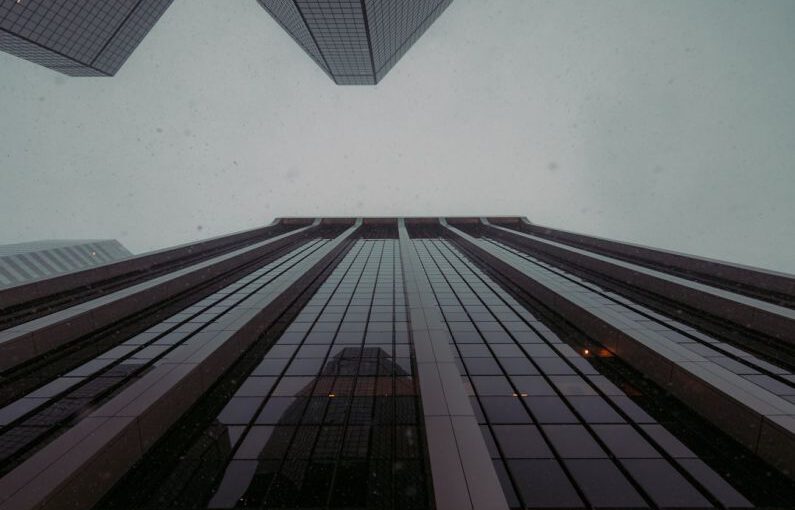 Solar Panels Weather - a very tall building with some very tall windows