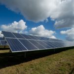 Payback Calculation Solar - solar panels on green field