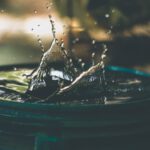 Solar Water Heater - water drop on bucket photo