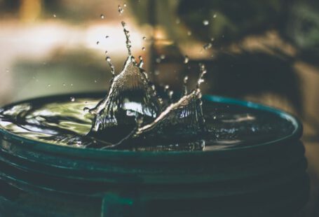 Solar Water Heater - water drop on bucket photo