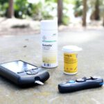 Solar Pond Pump - black smartphone beside white plastic bottle and black smartphone