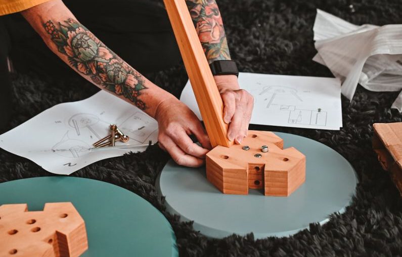 Solar Gadgets Diy - a person drawing on a piece of paper