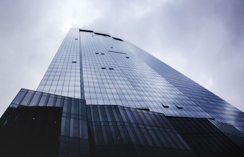 Solar Panels History - low angle photography of high rise building