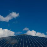 Solar Panel Close-up - a very tall building with a sky background