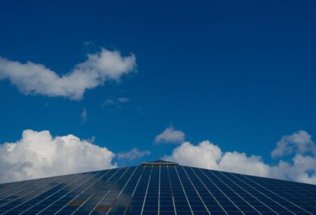 Solar Panel Close-up - a very tall building with a sky background